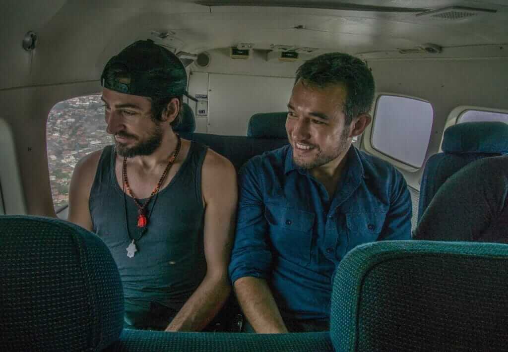 Luxury After Survival: Why It Feels So Much Better 5 Three men sitting in the private back of a plane.