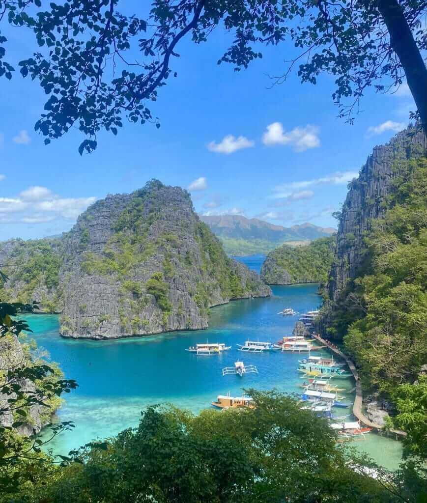 A boat docked in a bay in the philippines.