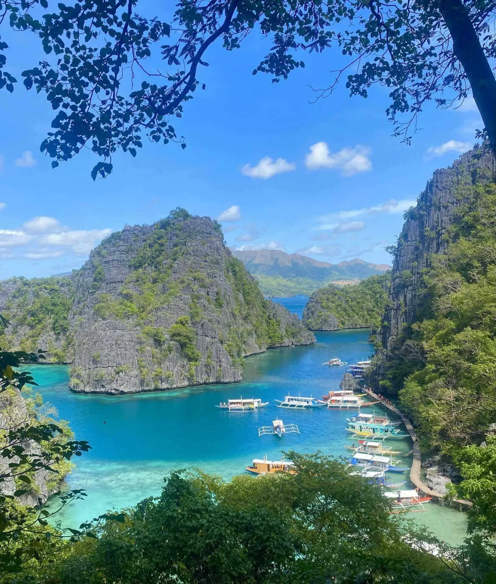 A boat docked in a bay in the philippines.