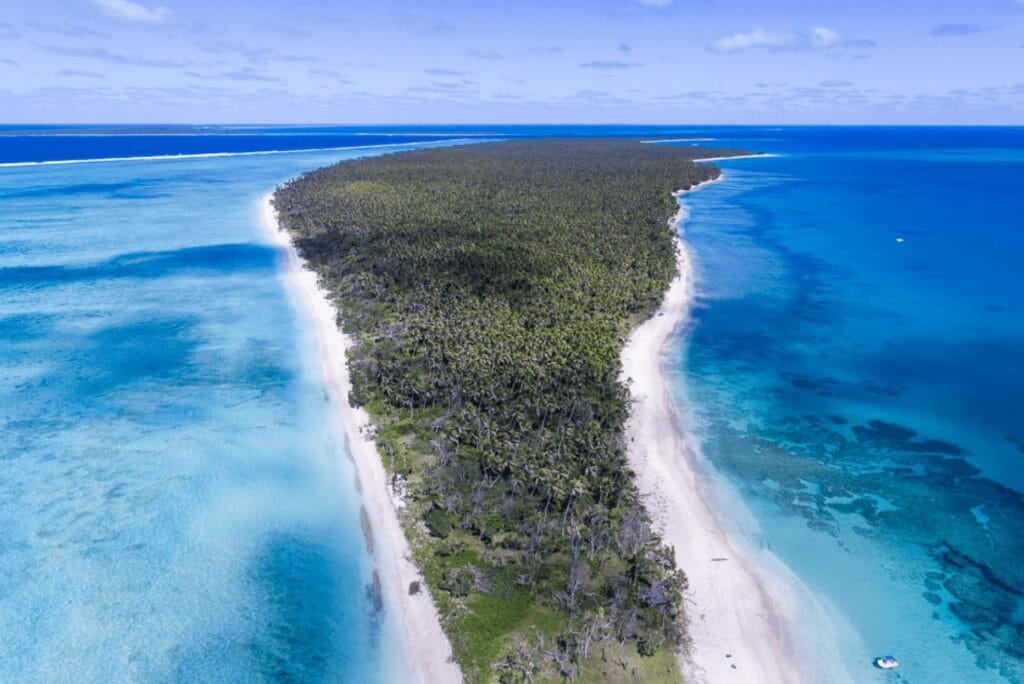 An aerial view of an island in the ocean.