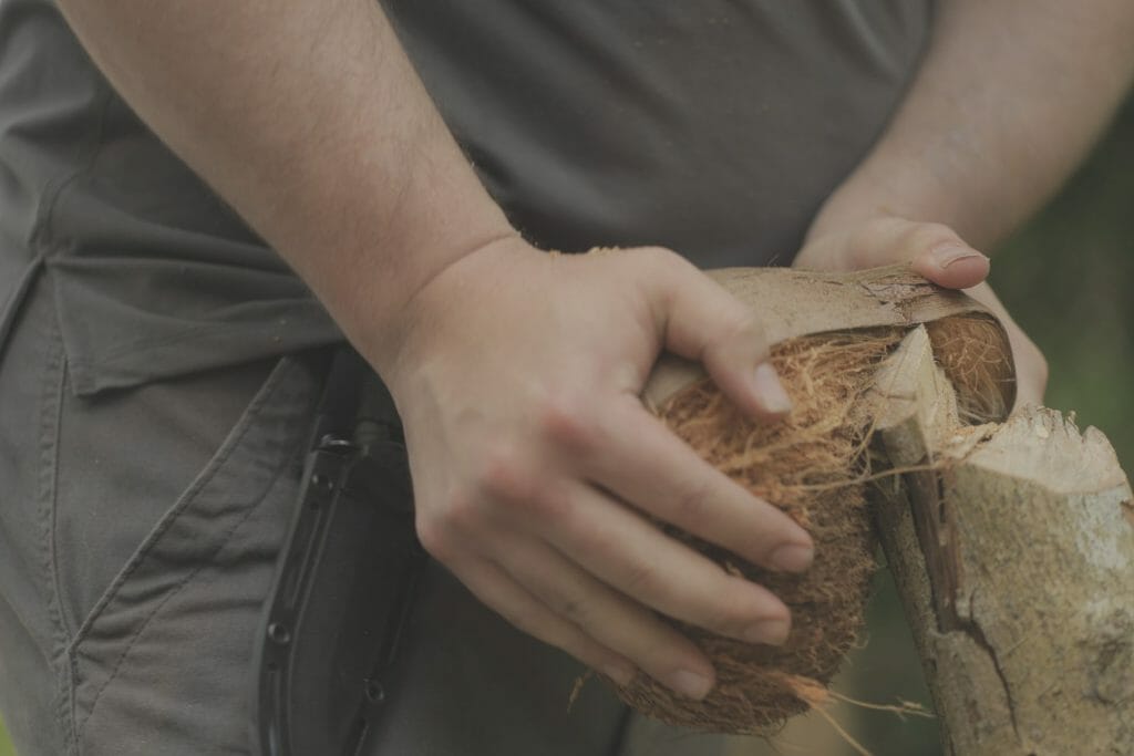 Man opening coconut I Philippines