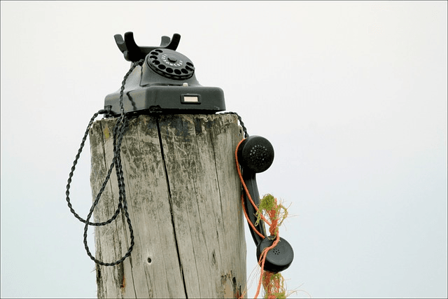 Unlocking a Balanced Life: The Comprehensive Guide to Digital Detox 4 Phone on a wooden mast