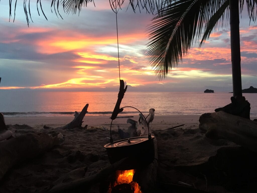 Pot on fire on beach