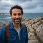 Sweden Alone bushcraft survival experience 27 Man with backpack hiking rocky coastal trail on a cloudy day, outdoor adventure, survival skills, exploration, ocean view, nature trek, wilderness, travel, hiking in nature, fitness walk.