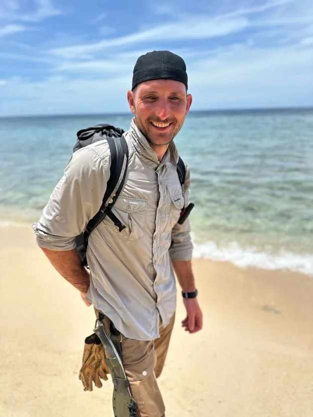 Man smiling on beach Indonesia