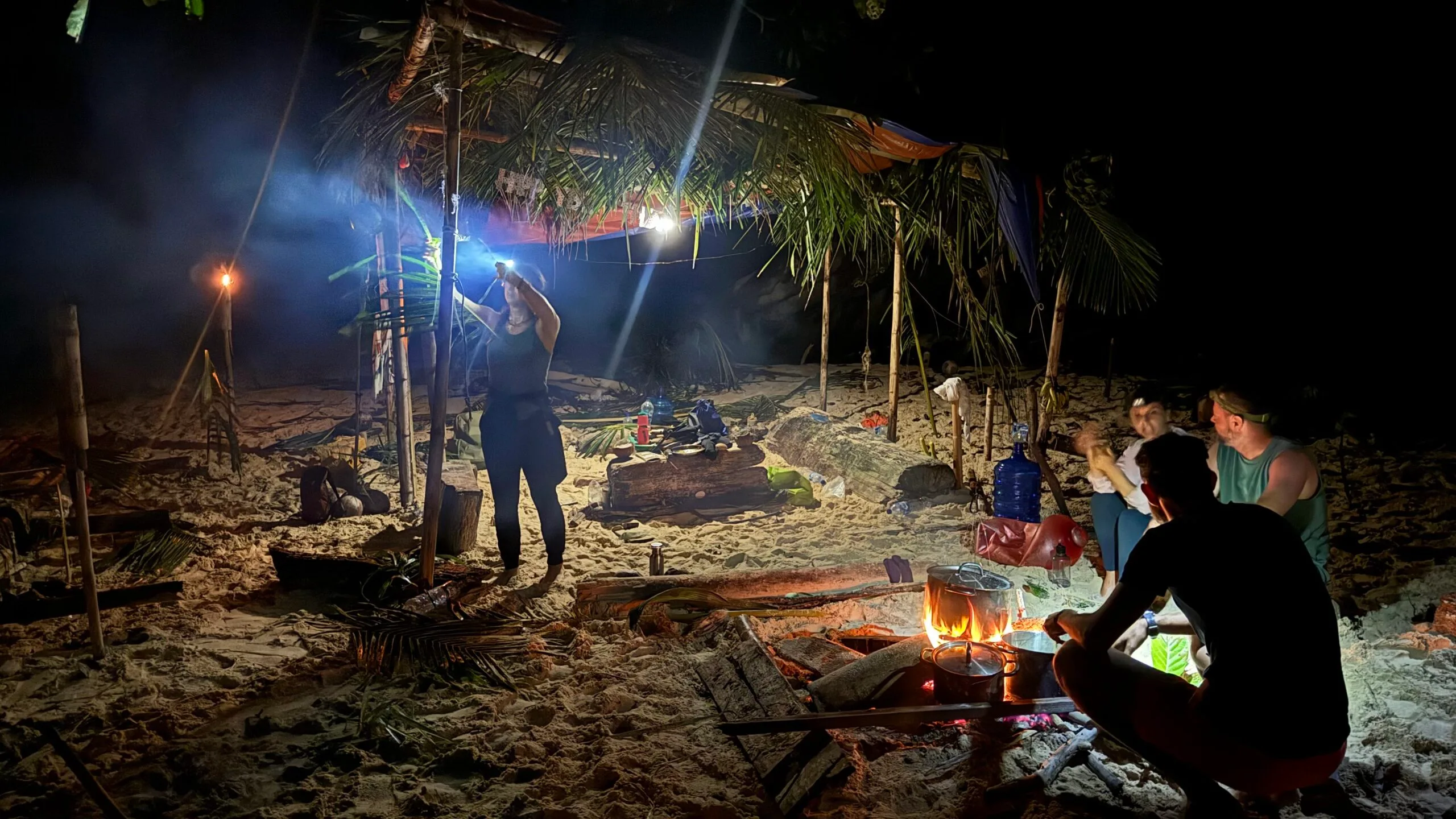 group cooking on beach Indonesia
