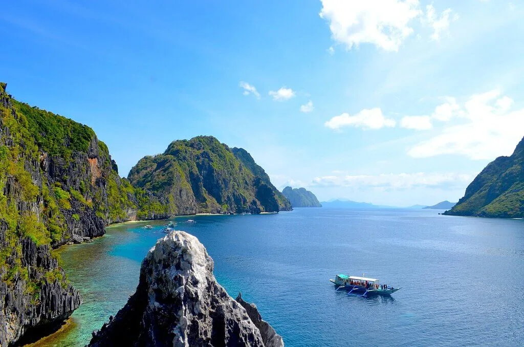 When is the Best Time to Visit Coron in Palawan? 1 Boat on ocean Philippines
