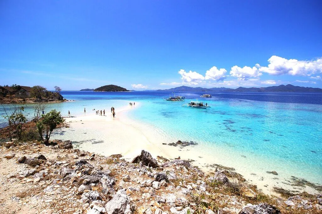 People on beach in Palawan