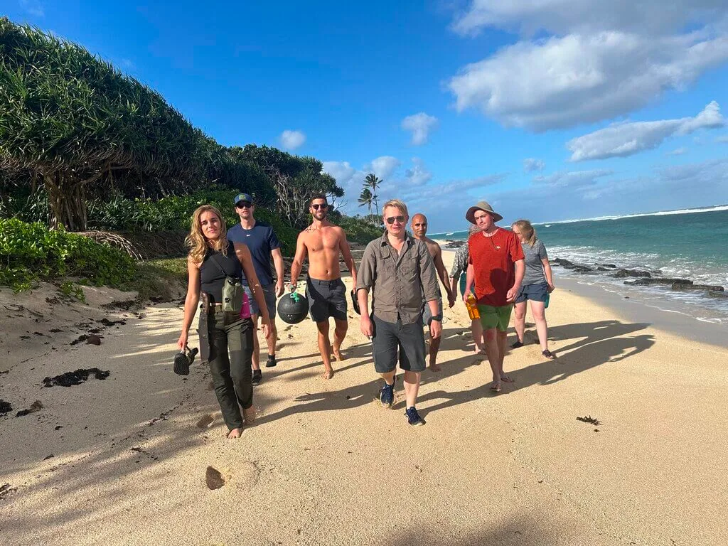 a group walking on the beach