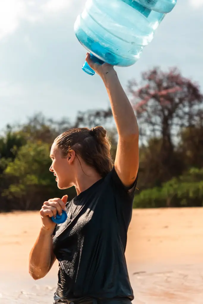 Why Real Adventure Demands Real Risk and Why We Manage It the Right Way 5 Refillable water bottle on a desert island for survival, staying hydrated and healthy.