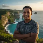 Desert Island Survival Adventure in Tonga 23 Adventurous man smiling on a scenic tropical island coast at sunset, showcasing survival skills and outdoor adventure in remote island environments.