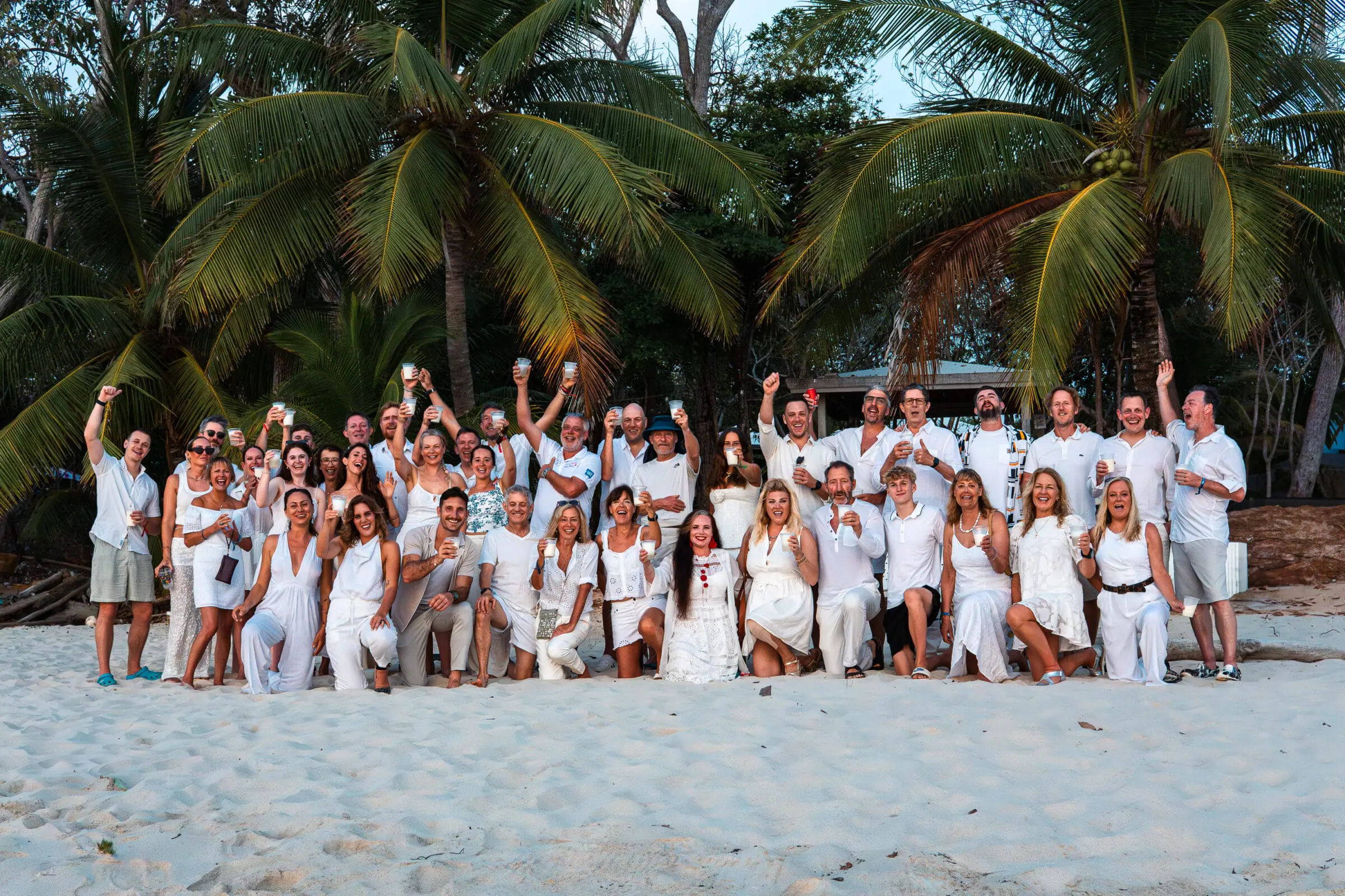 Group photo on a beach in Panama, possibly from a Panama survival adventure.